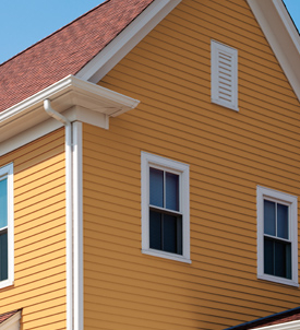 Yellow house with Apex Siding